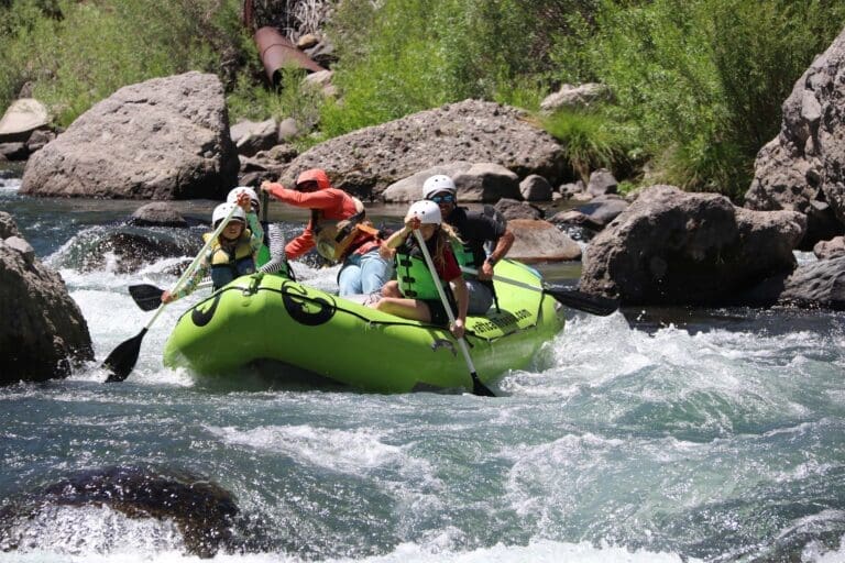 Family with kids rafting on the Truckee River sm